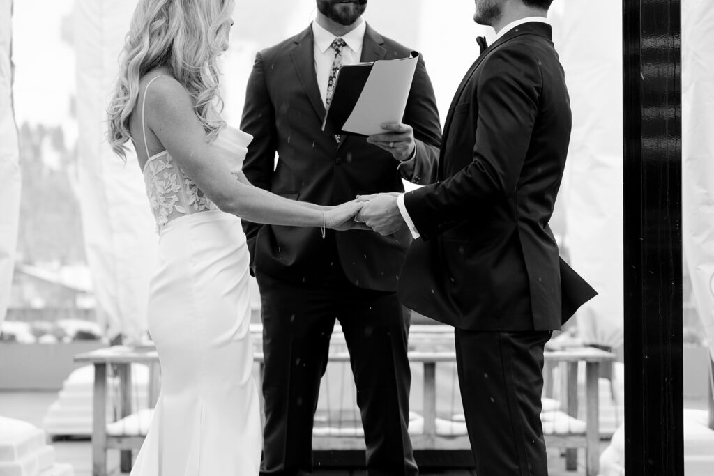 Bride and groom exchange vows during an intimate wedding ceremony