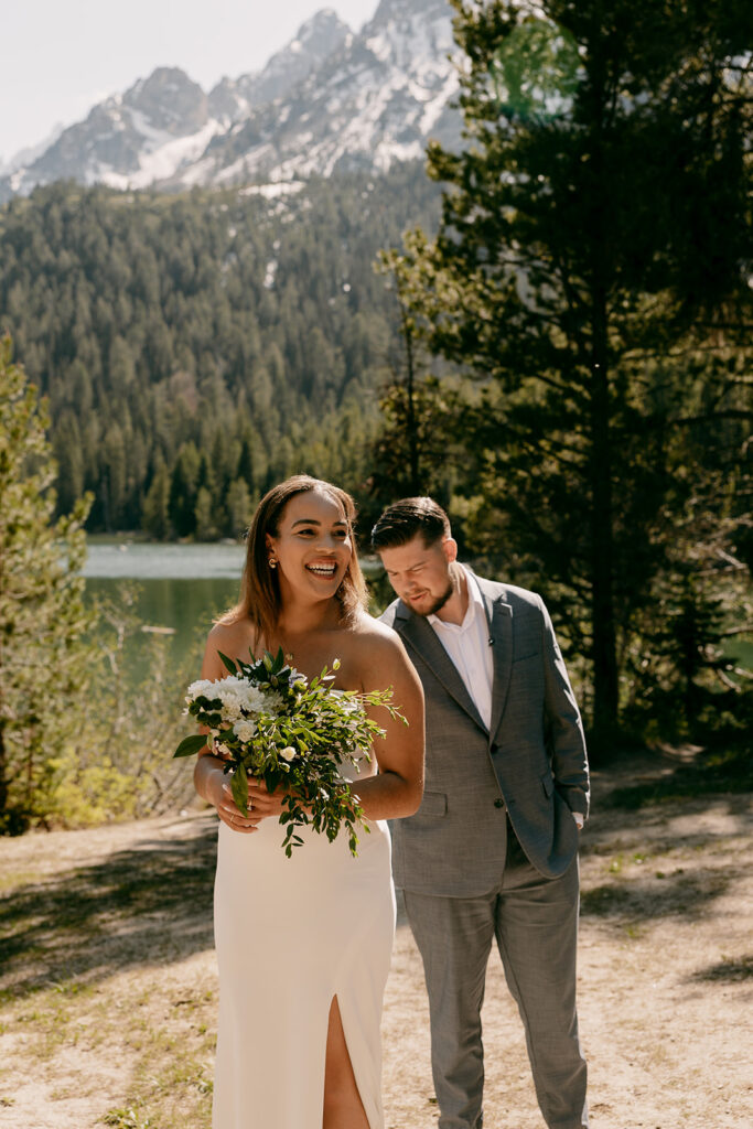 Groom checking out his bride during String Lake first look
