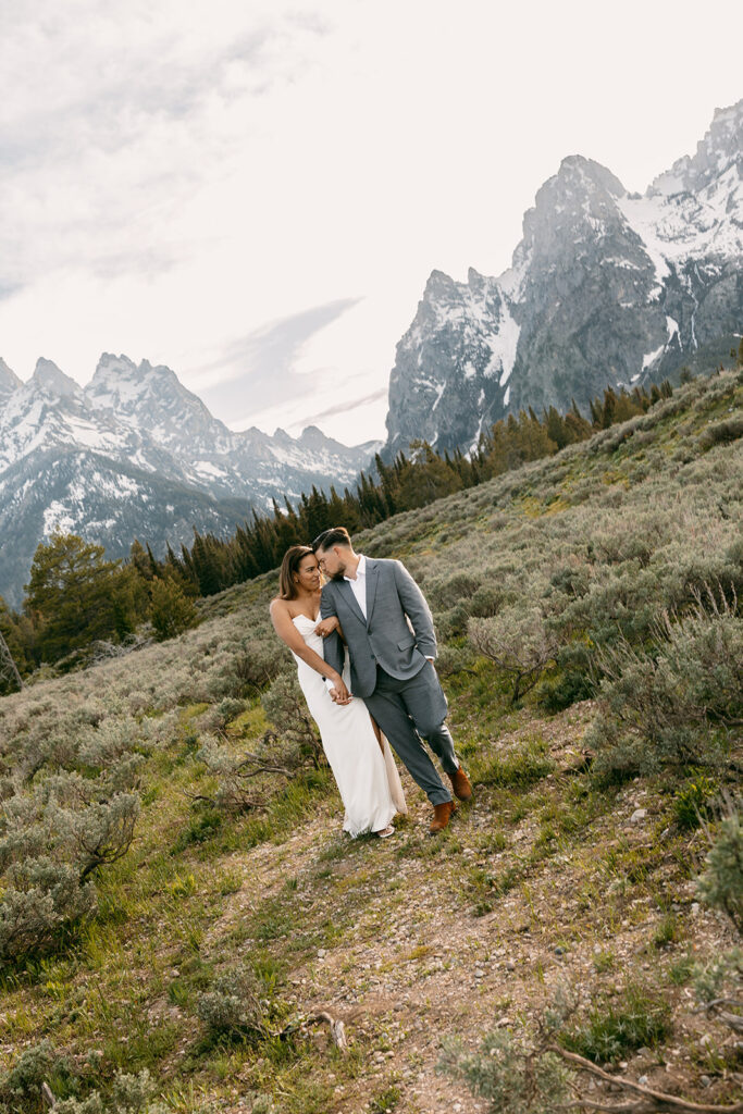 Bride and groom rest their foreheads together during summer elopement in the Tetons portraits
