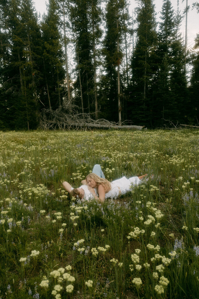 Woman smiles at her fiancé during Wyoming adventure photography session